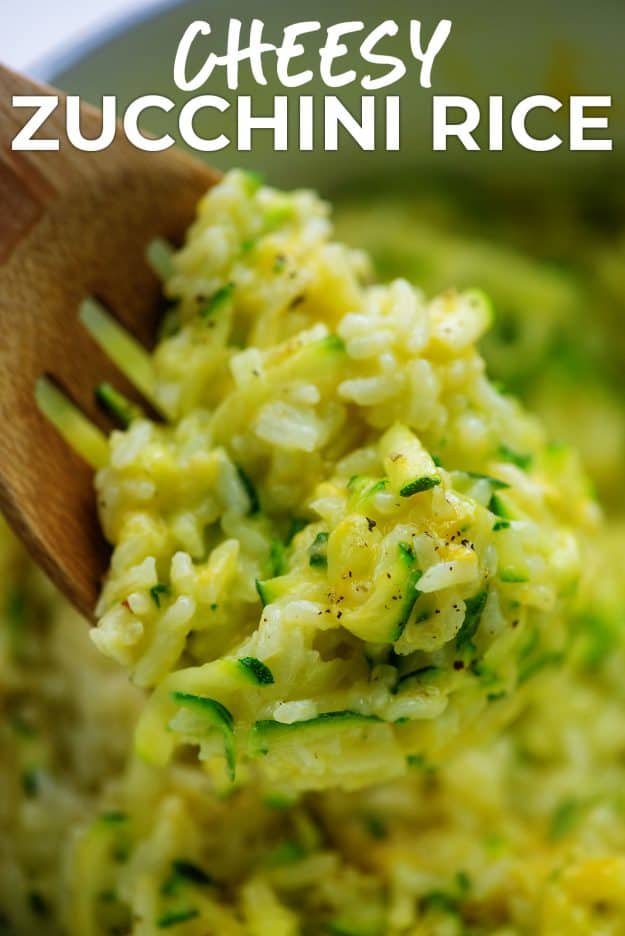 zucchini and rice on wooden spoon