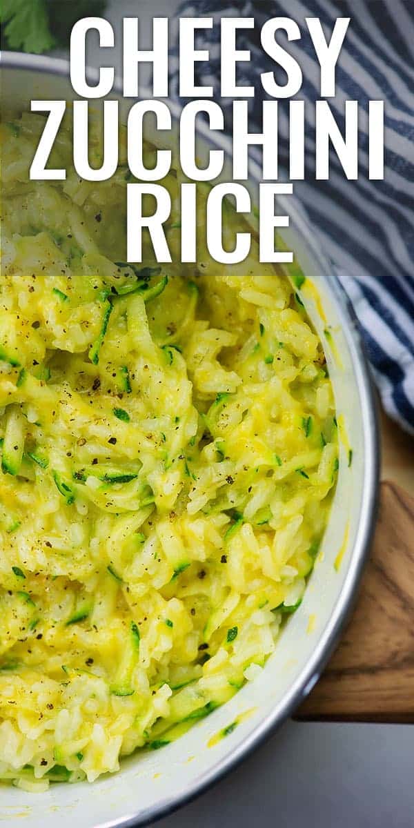 cheesy zucchini rice is white pan with blue napkin