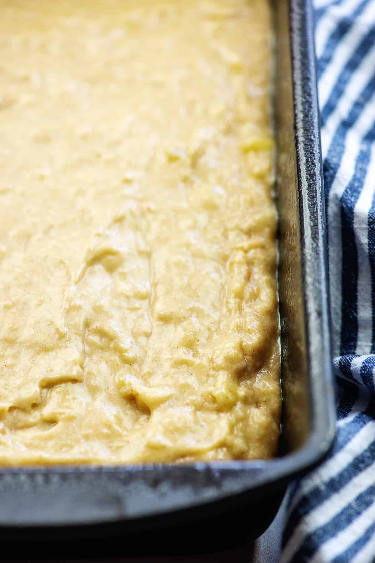 banana bread batter in metal loaf pan