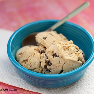 A close up of a bowl of ice cream with chocolate chip cookie dough