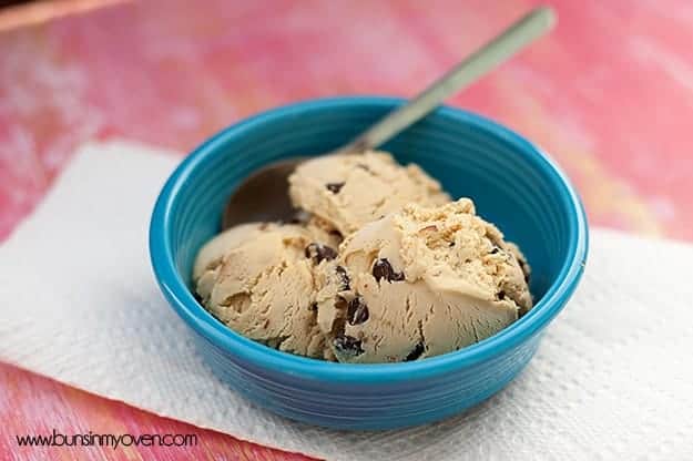 A close up of a bowl of ice cream with chocolate chip cookie dough