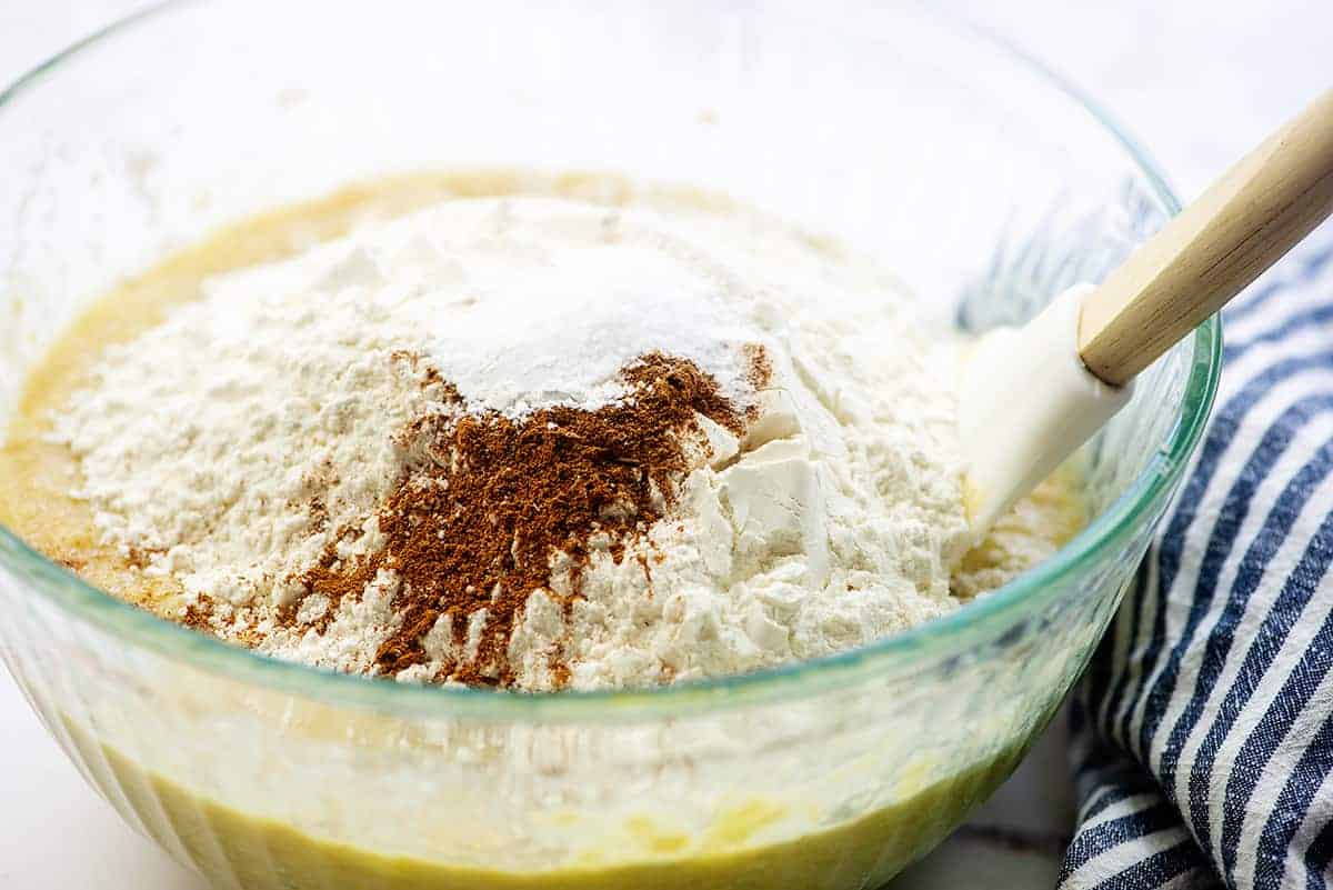 ingredients for banana bread in glass mixing bowl