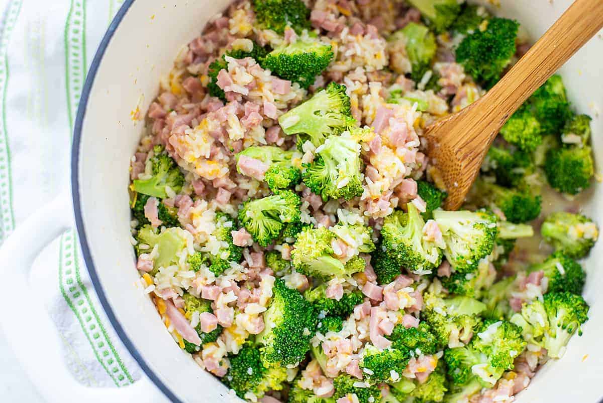 overhead view of rice and broccoli in pot.