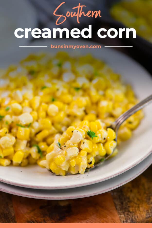 Creamed corn on white plate.