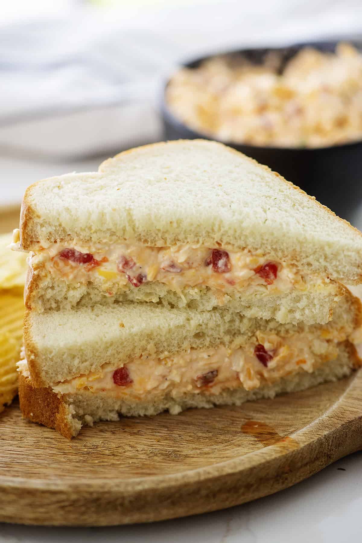 pimento cheese between two slices of bread.