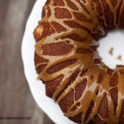 An overhead view of apple cider pound cake on a cake stand.