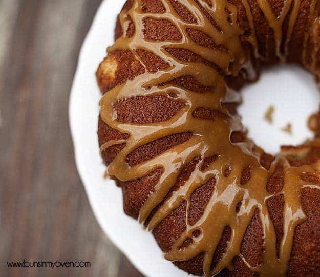 An overhead view of apple cider pound cake on a cake stand.