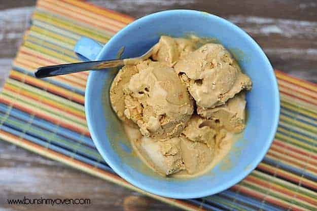 An overhead view of caramel ice cream in a bowl