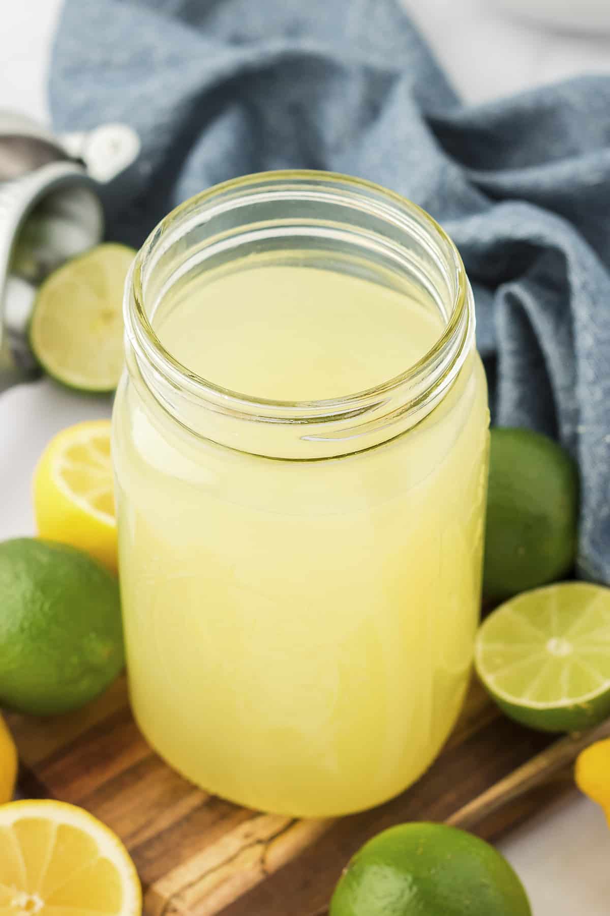 Mason jar full of homemade sour mix.