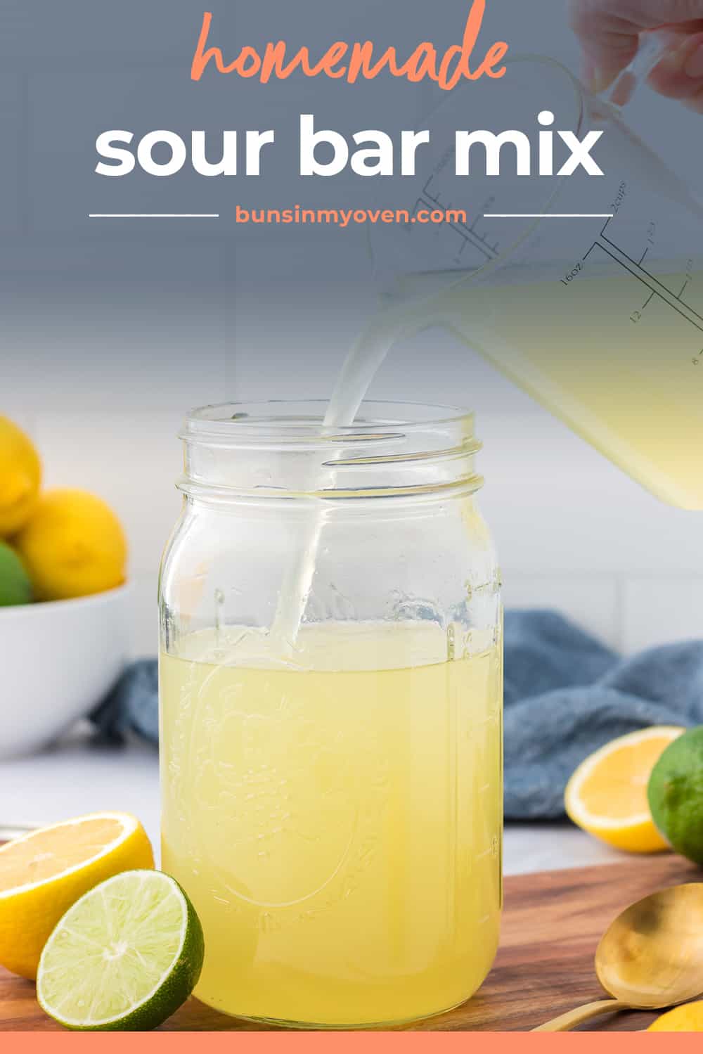 Sour mix being poured into mason jar.