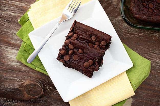 Overhead view of chocolate pudding cake with a fork.