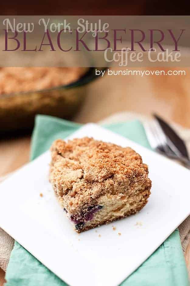 A piece of coffee cake on a square plate.