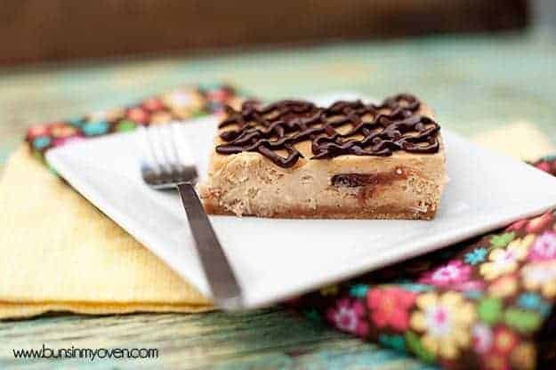 A square piece of peanut butter cup cheesecake.