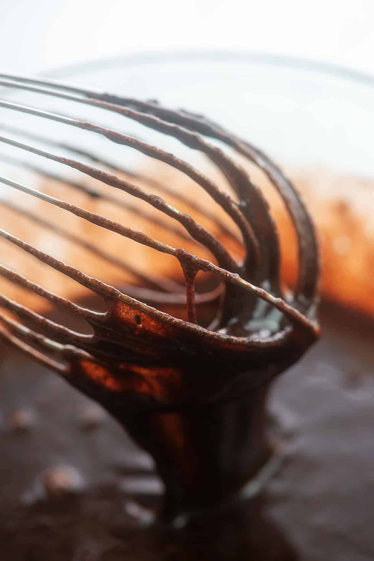 chocolate filling for pecan pie on whisk.