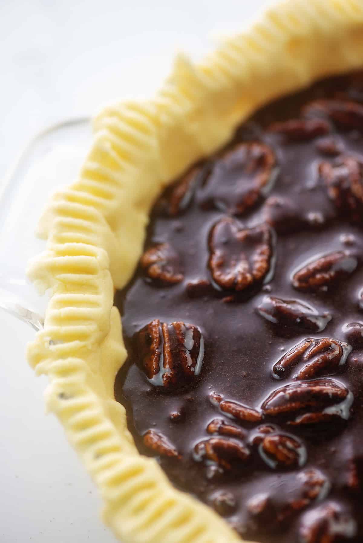 pie crust filled with chocolate pecan filling.