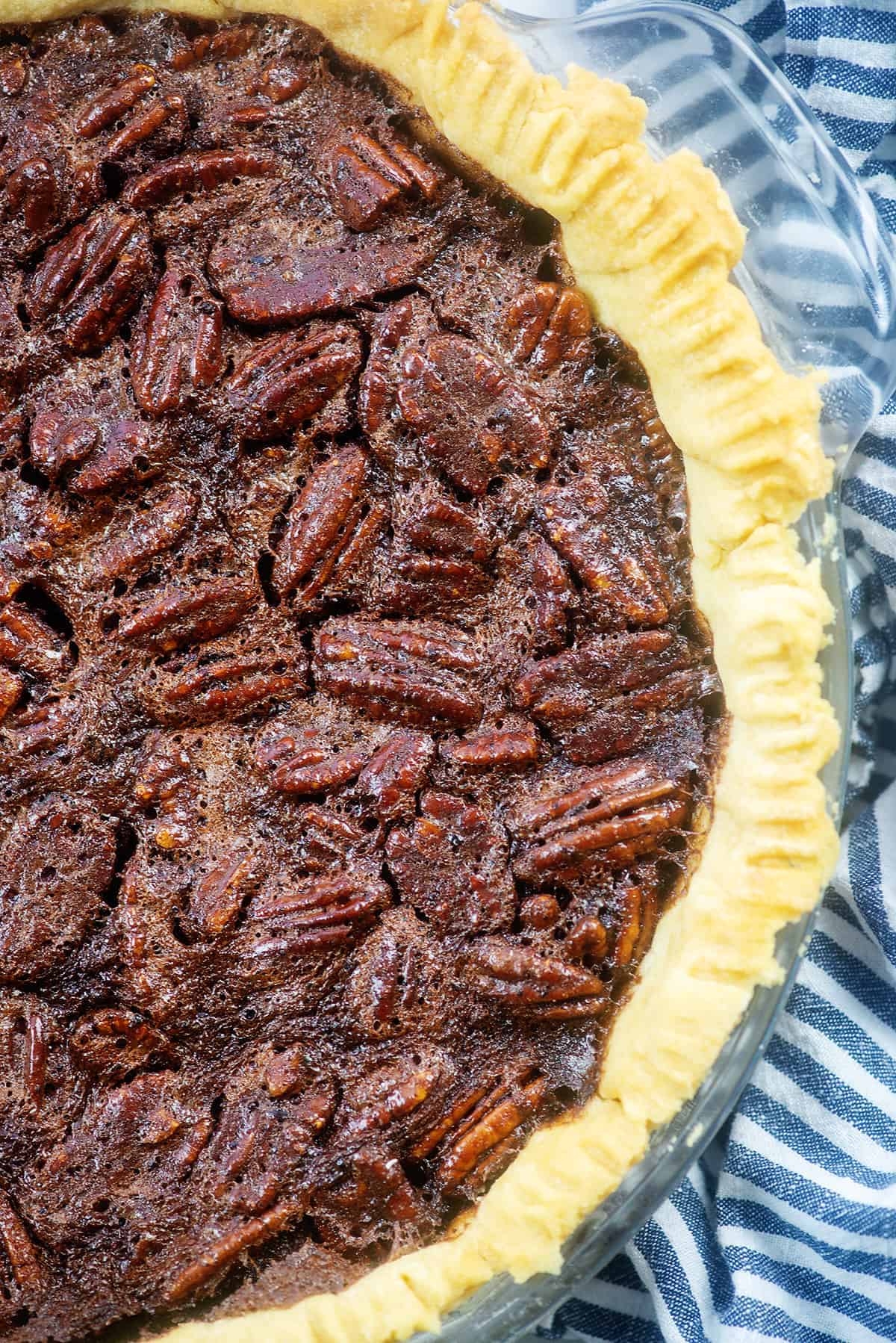 chocolate pecan pie in homemade pie crust.