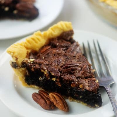 plates with pecan pie on top.