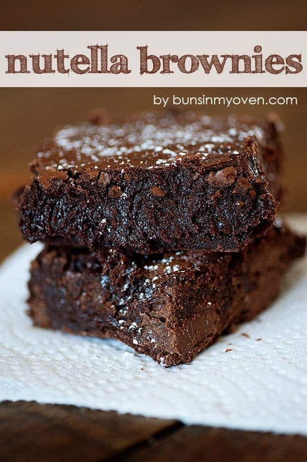 A close up of two stacked Nutella brownies.