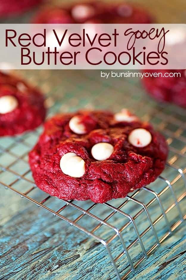 A red velvet cookie on a wire cooling rack.