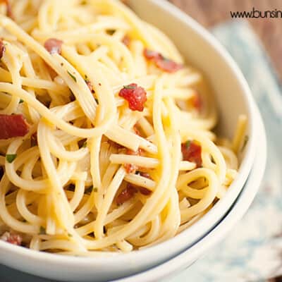 A bowl of pasta in a white bowl.