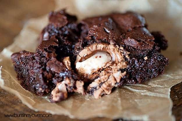 A close up of a cadbury creme egg brownie on wax paper