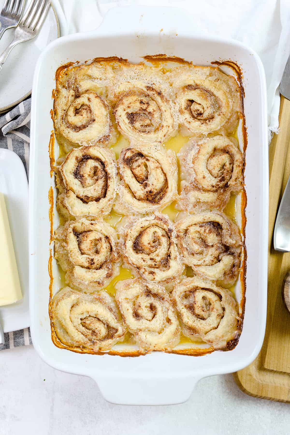 butter roll in white baking dish.