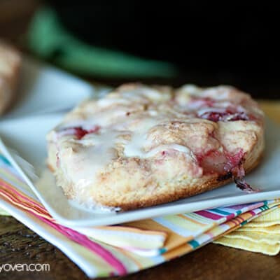 A glazed biscuit on a white plate