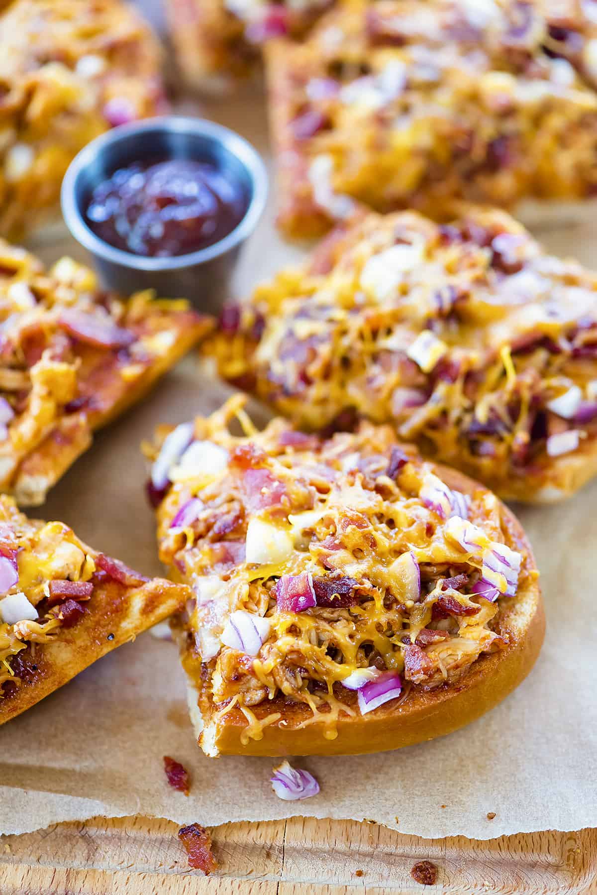 BBQ pizza bread with side of bbq sauce.