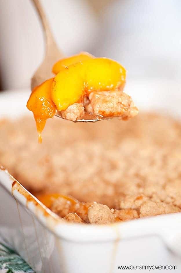 A spoonful of peach cobbler.