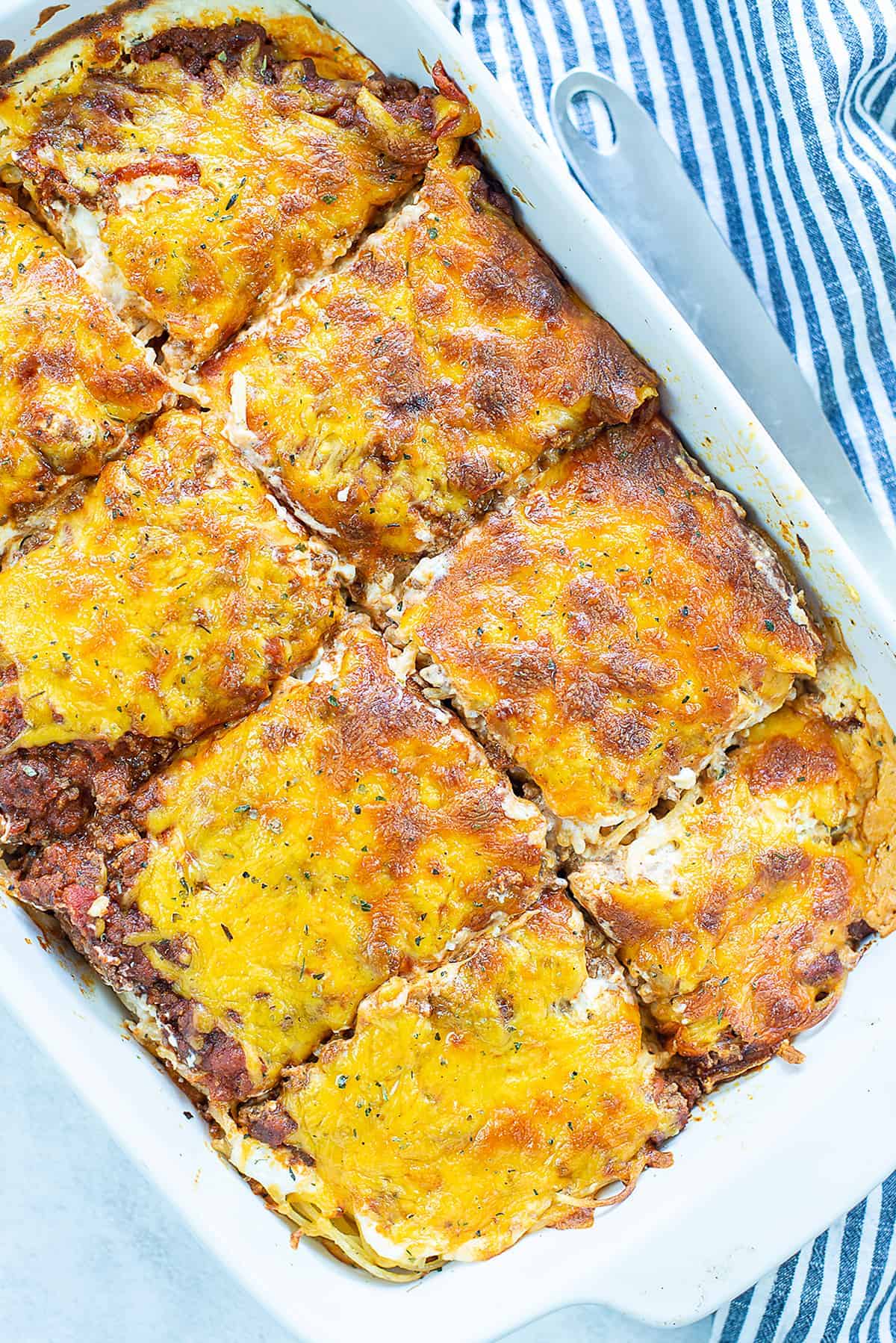 baked spaghetti in white baking dish.