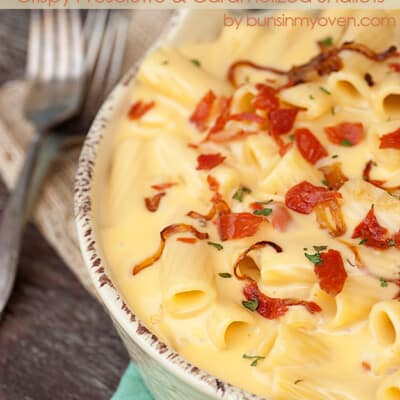 A close up of a bowl of cheesy rigatoni