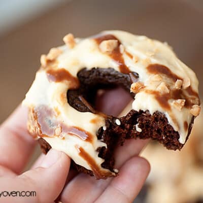 A cake donut topped with a toffee frosting