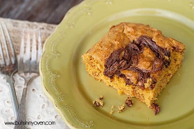 Overhead view of a pumpkin bar on a decorative plate.