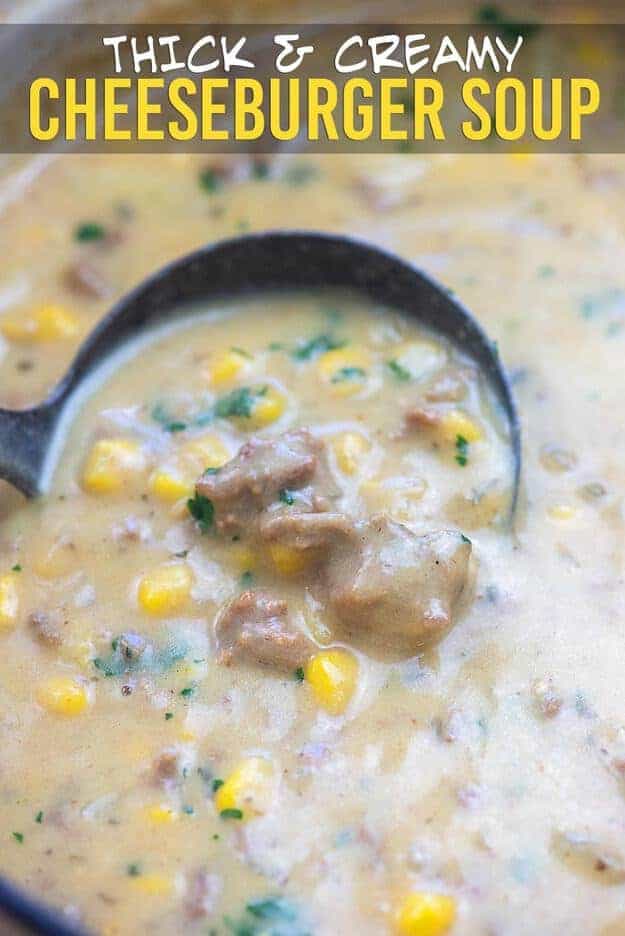 A ladle dipped into cheeseburger soup.