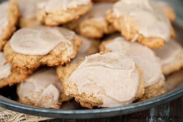 A close up of cookies topped with brown butter glaze icing.