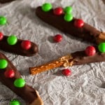 A pretzel stick dipped in chocolate and topped with reeses pieces.