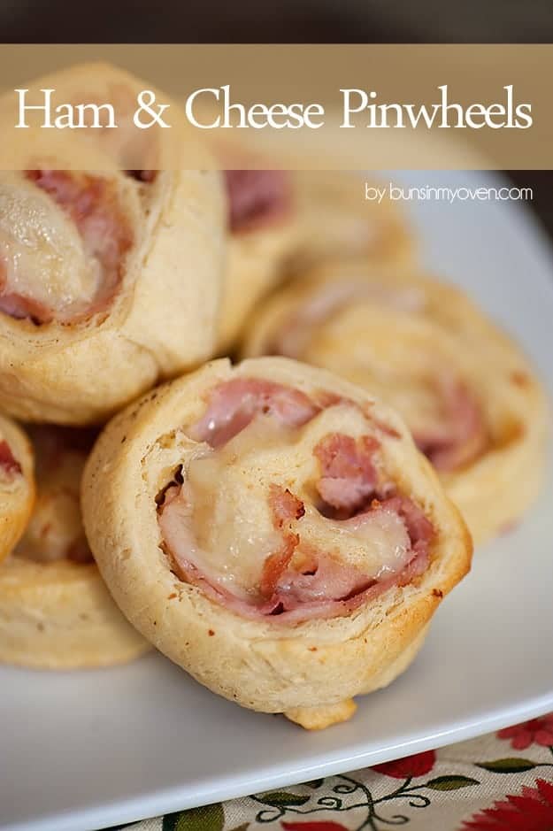 A close up of a stack of ham and cheese pinwheels.