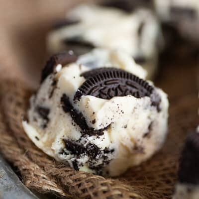 A close up of white fudge with Oreo pieces in it.