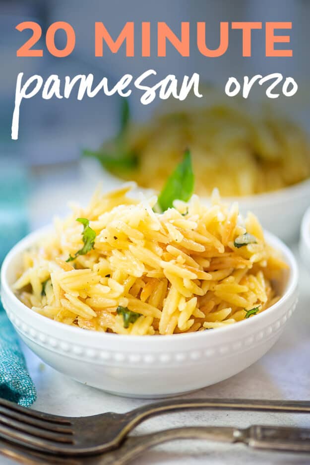 cheesy orzo in white bowl with text for Pinterest.