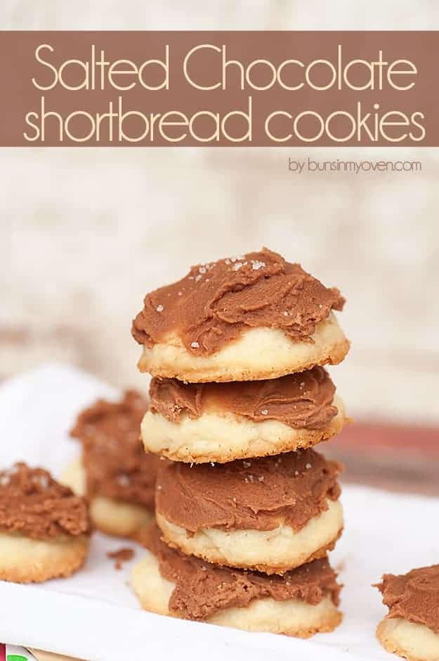 A stack of chocolate frosted shortbread cookies.