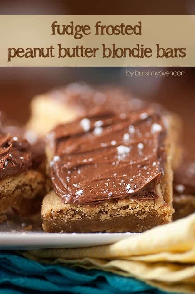 A close up of a chocolate frosted peanut butter bar.
