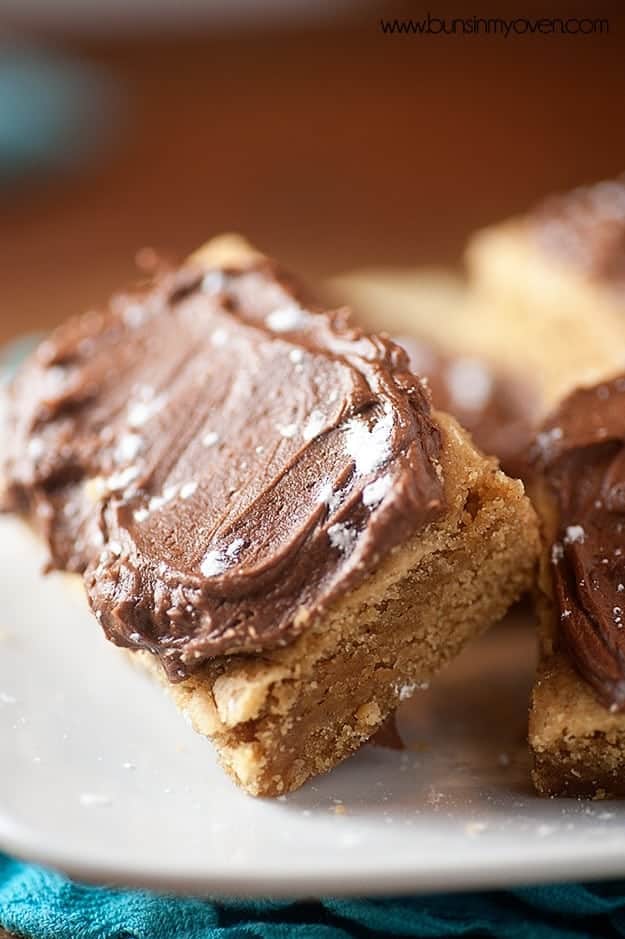 Peanut butter bars leaned up against one another.