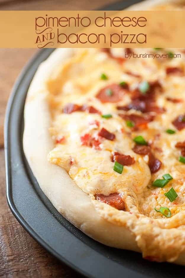 A close up of bacon and cheese pizza in a pizza pan.