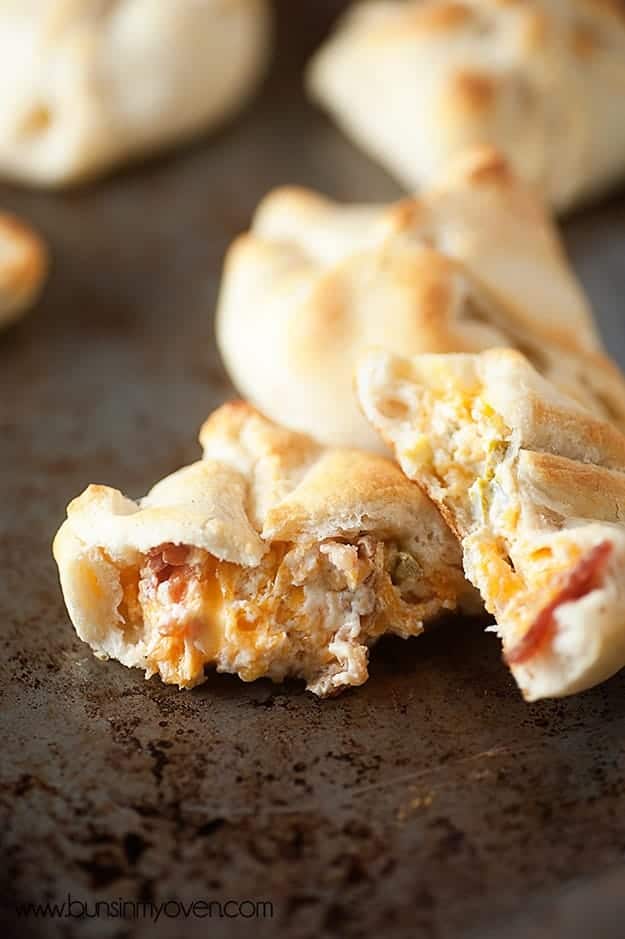 These cheesy jalapeno bacon bombs use crescent roll dough for an easy snack that is full of gooey cheese and bacon!