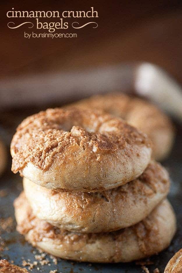 A close up of a stack of cinnamon crunch bagels.