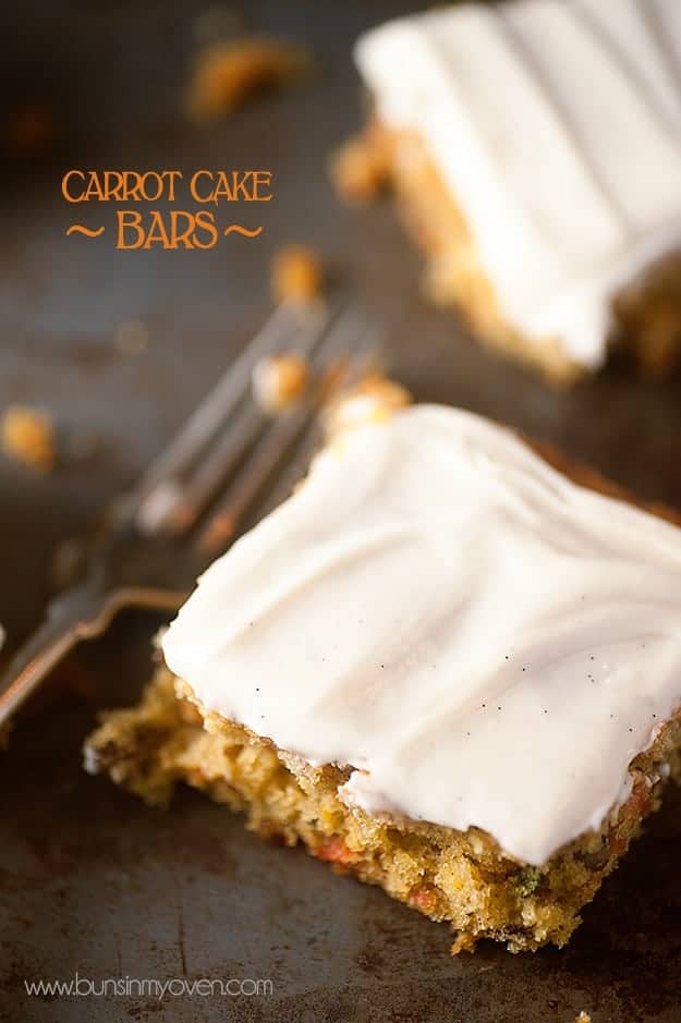 A close up of a piece of cake on a baking sheet with a fork.