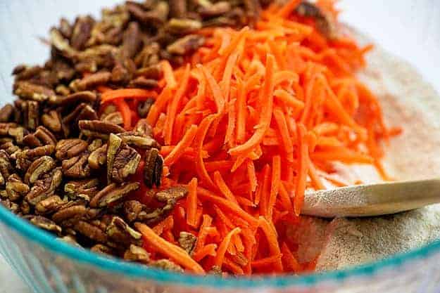 ingredients for carrot cake bars in glass bowl