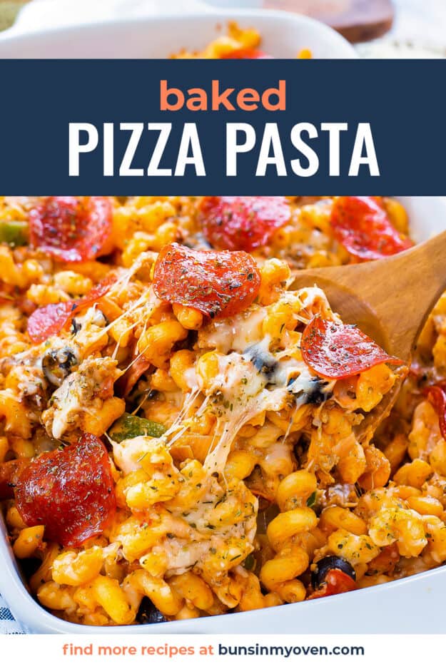 Wooden spoon in baked pizza pasta.