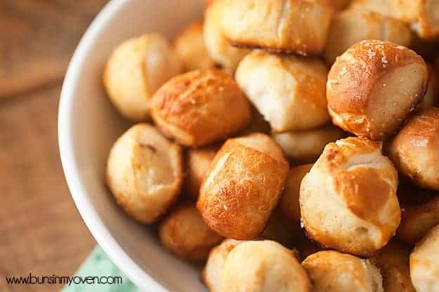 An overhead view of many pretzel nuggets in a large bowl.