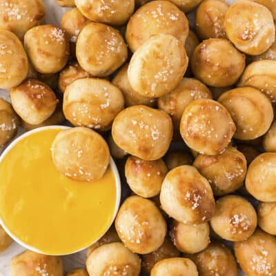 Soft pretzel bites with cheese sauce.